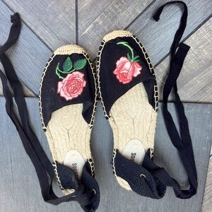 Rose embroidered toe on black ankle strapped espadrilles